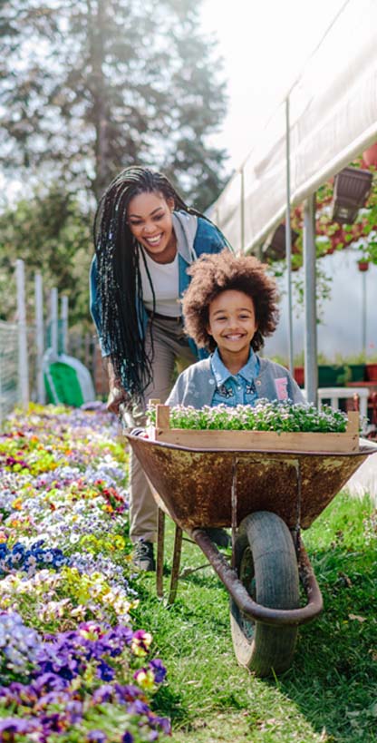Woman and girl in a flower nursery