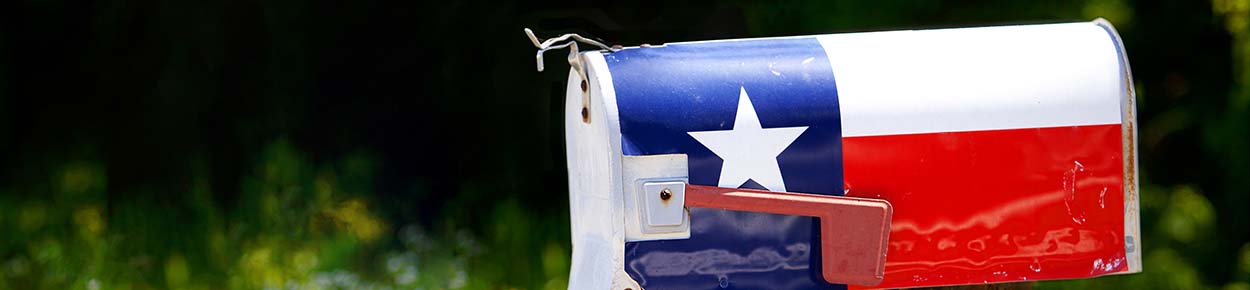 Texas state flag painted on mailbox